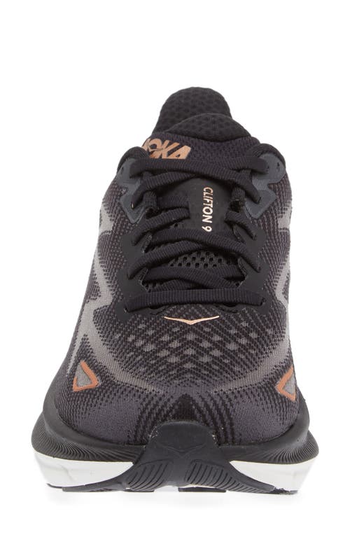 Shop Hoka Clifton 9 Running Shoe In Black/copper