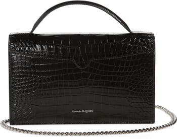 CASSANDRA Mini top handle bag in crocodile-embossed shiny leather