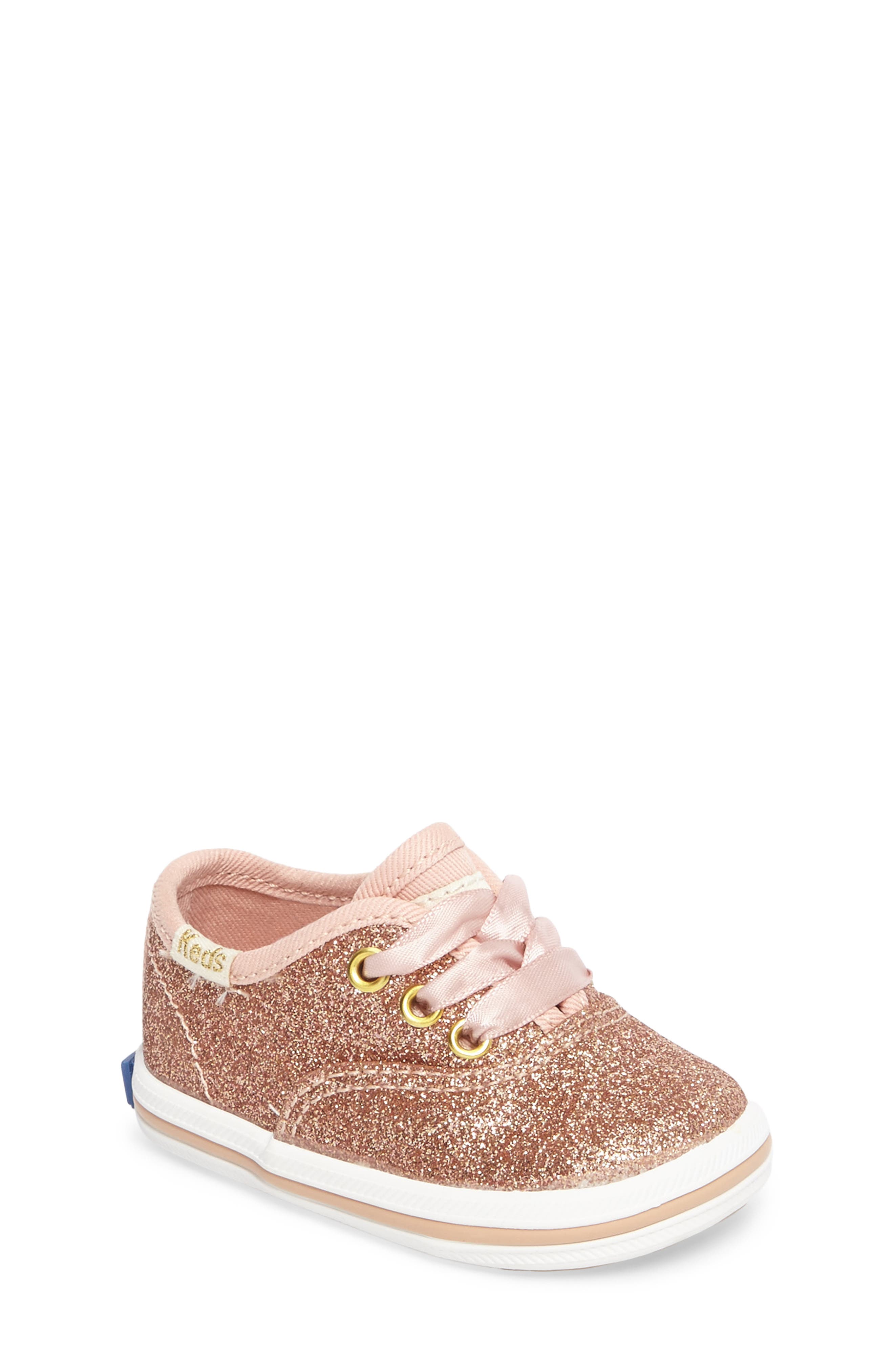 UPC 884401127258 product image for Keds(R) x kate spade new york Champion Glitter Crib Shoe in Rose Gold at  | upcitemdb.com