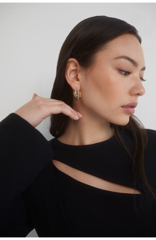 Shop Nadri Juno Layered Hoop Earrings In Gold