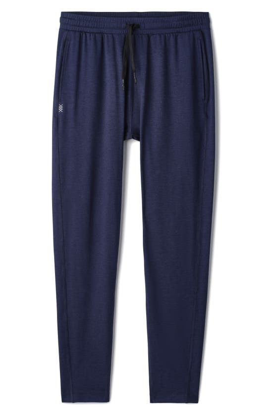 Shop Rhone Ooo Tapered Knit Pants In Navy