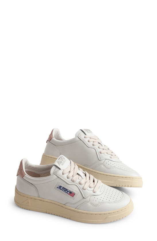 Shop Autry Medalist Low Sneaker In White/pink