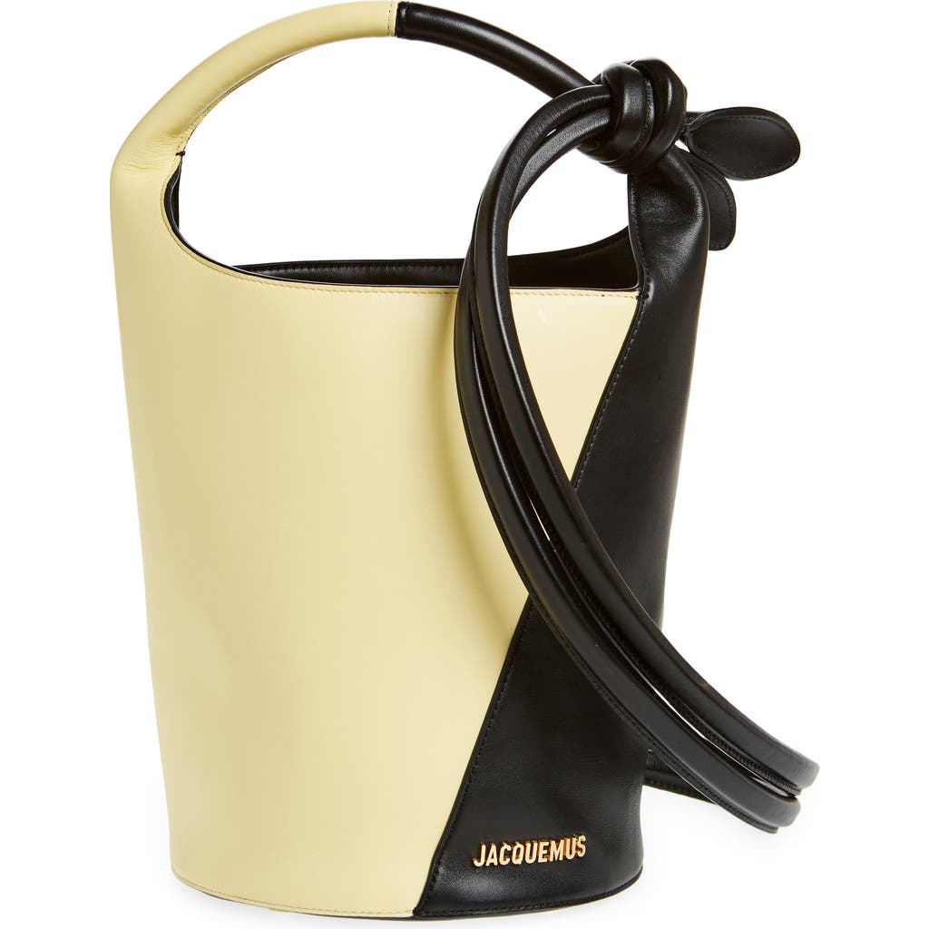 Jacquemus Le Petit Tourni Leather Bucket Bag In Pale Yellow/black