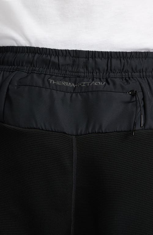 Shop Nike Therma-fit Adv A.p.s. Fleece Fitness Pants In Black/white