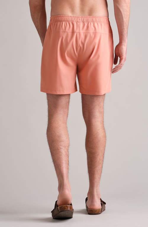 Shop Rhone 5.5-inch Water Repellent Swim Trunks In Coral Clay