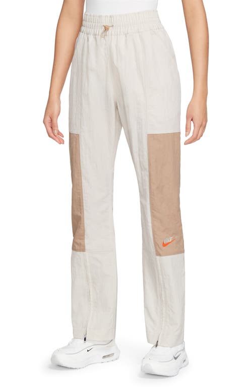 Shop Nike City Utility Zip Cuff Track Pants In Light Orewood Brown/hemp