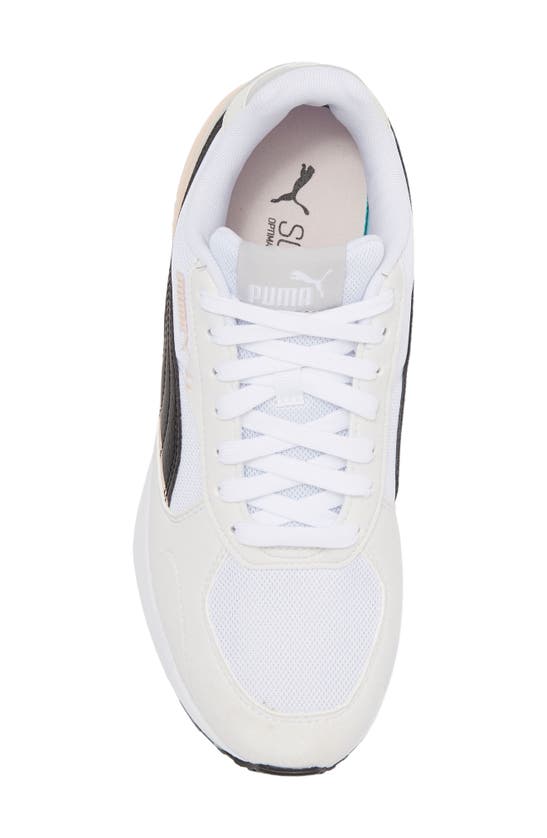 Shop Puma Lace-up Graviton Sneaker In Alpine Snow- White-amber