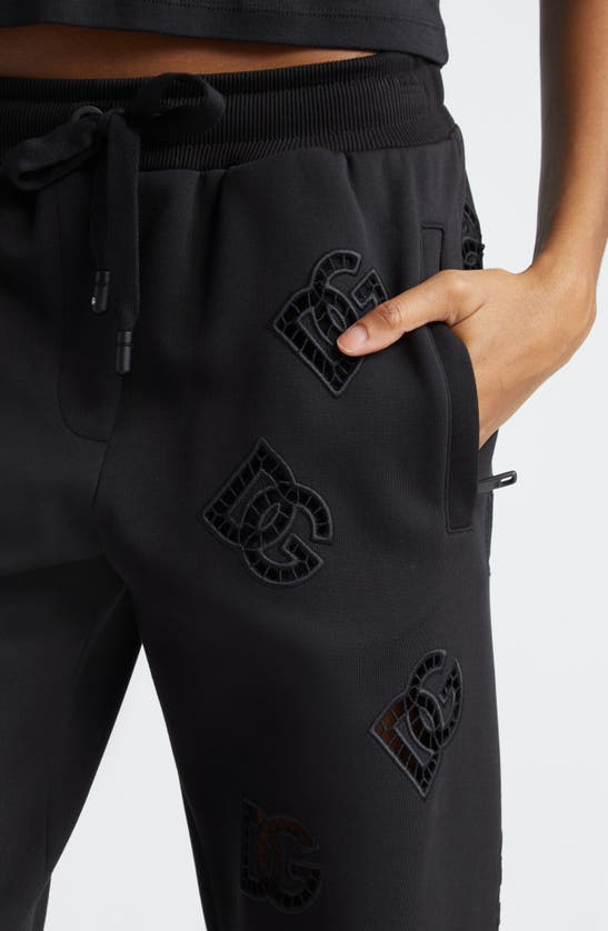 Shop Dolce & Gabbana Eyelet Logo Cotton Blend Joggers In N0000nero