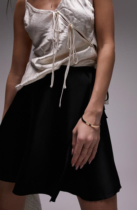 Shop Topshop Satin Wrap Miniskirt In Black