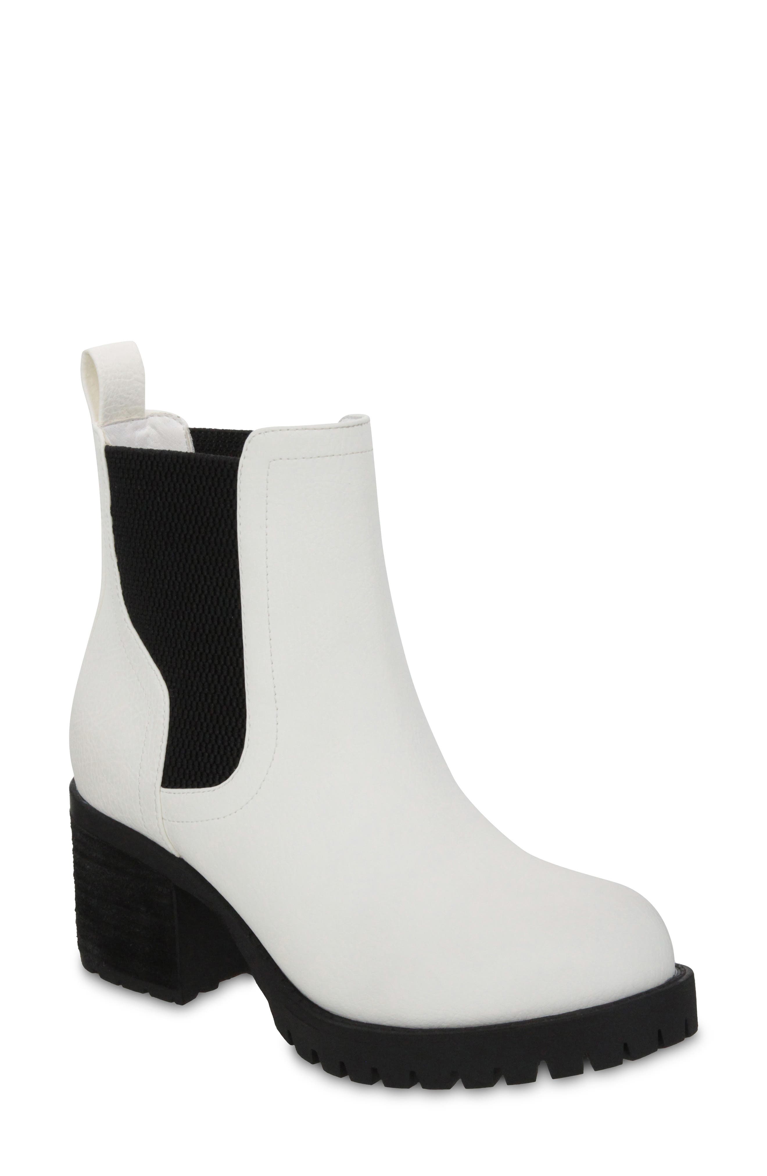 white boots black sole