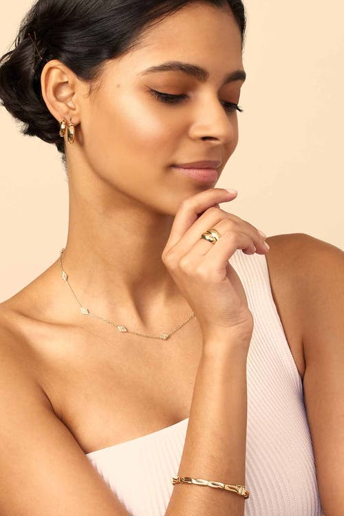 Oradina Amore Bangle In Yellow Gold