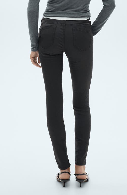 Shop Mango Coated Low Rise Push-up Skinny Jeans In Black