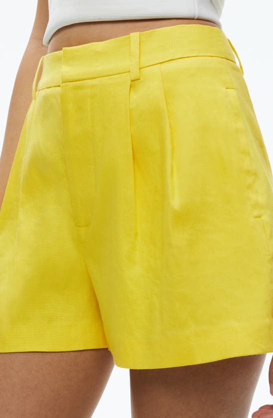 Shop Alice And Olivia Alice + Olivia Conry Pleated Linen Blend Shorts In Happy Yellow