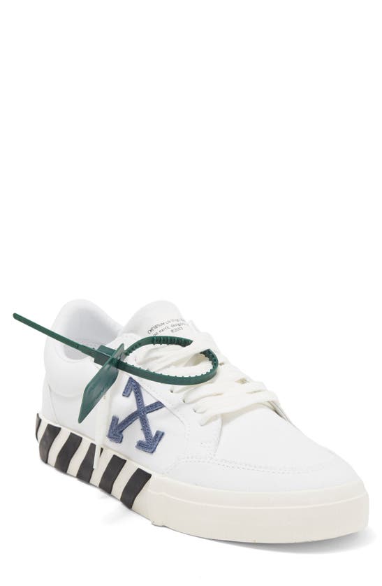 OFF-WHITE CANVAS & VULCANIZED RUBBER LOW TOP SNEAKER