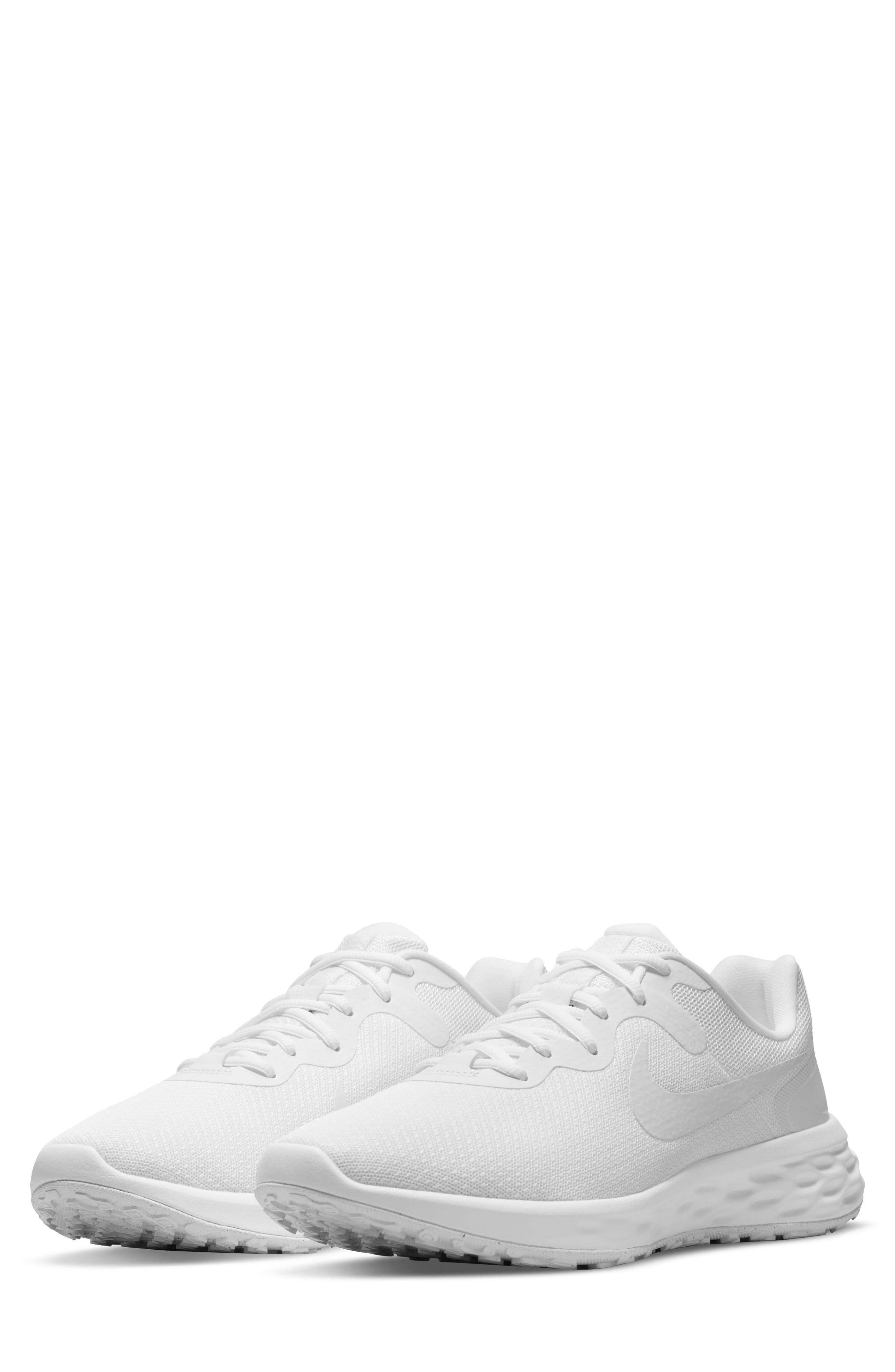 all white athletic sneakers
