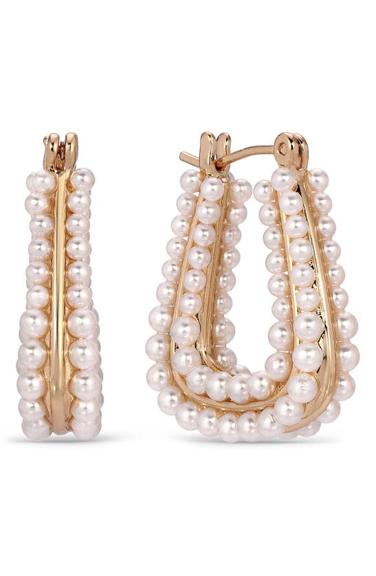 Shop Ettika Imitation Pearl Oval Hoop Earrings In Gold