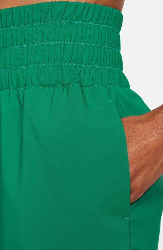 Shop Nike Dri-fit Ultrahigh Waist 3-inch Brief Lined Shorts In Malachite/ Reflective Silv