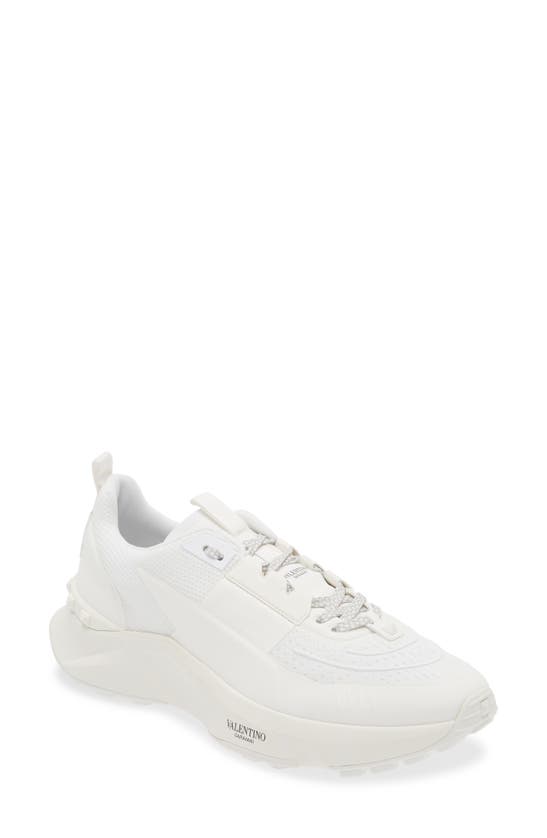 Shop Valentino Rockstud Knit Sneaker In Bianco