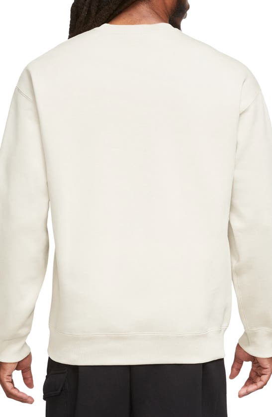 Shop Nike Solo Swoosh Oversize Crewneck Sweatshirt In Sail/ White
