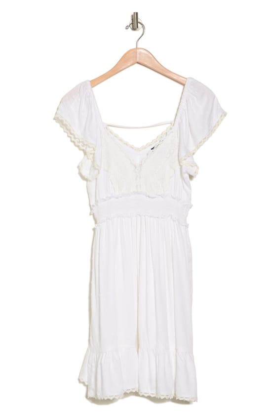 Angie Flutter Sleeve Smocked Clip Dot Dress In Ivory