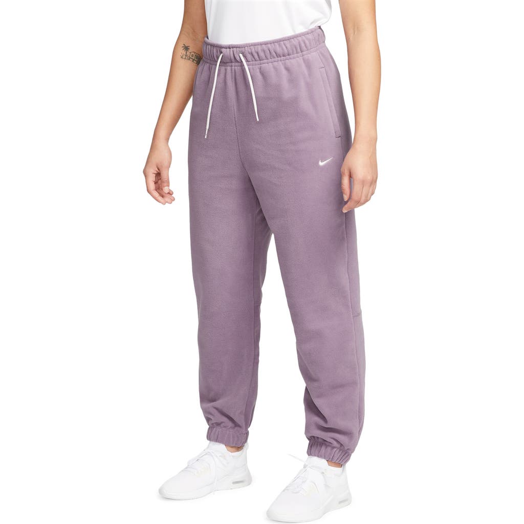 Shop Nike Therma-fit Pants In Violet Dust/pale Ivory
