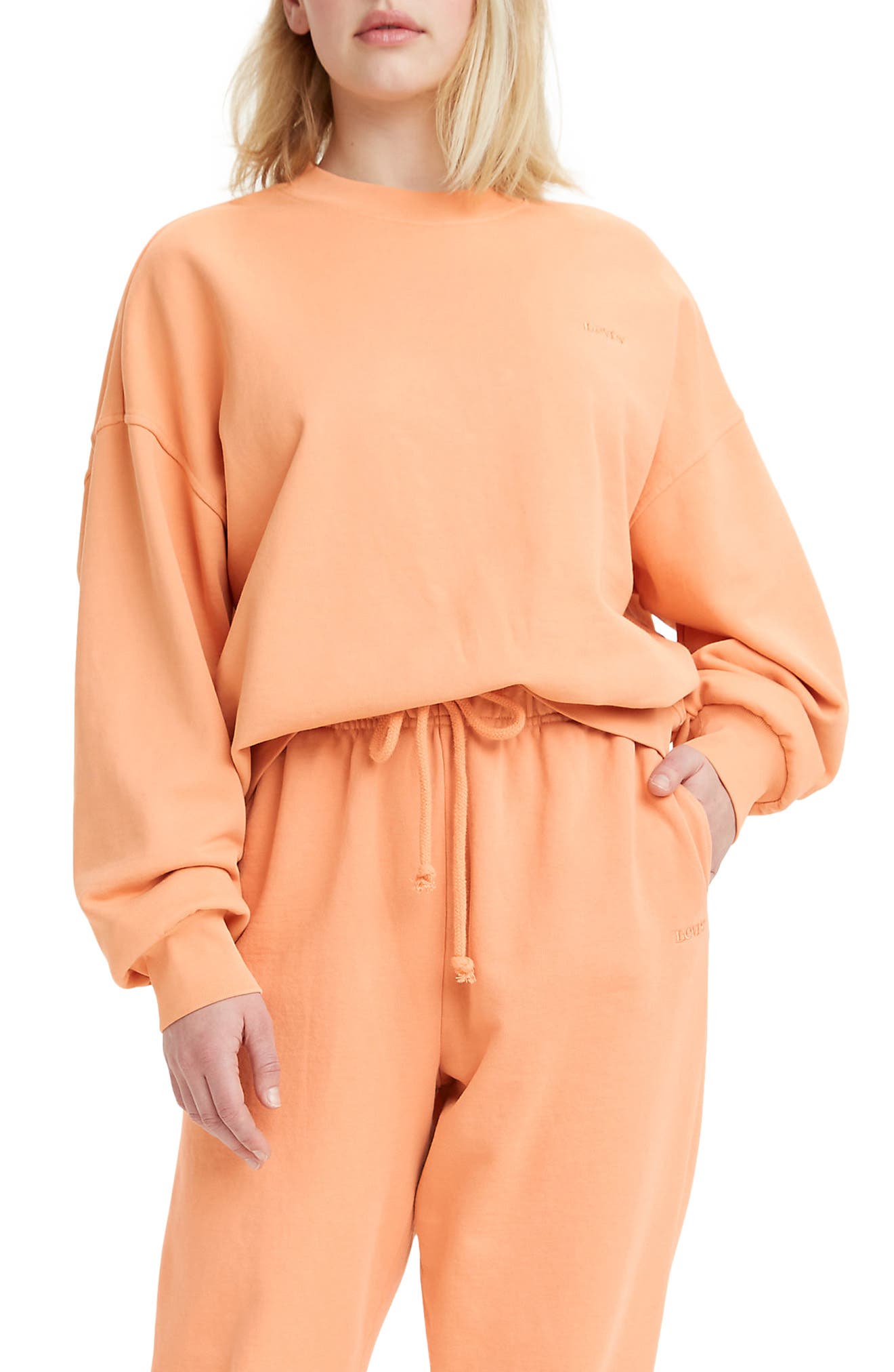 light orange sweatshirt