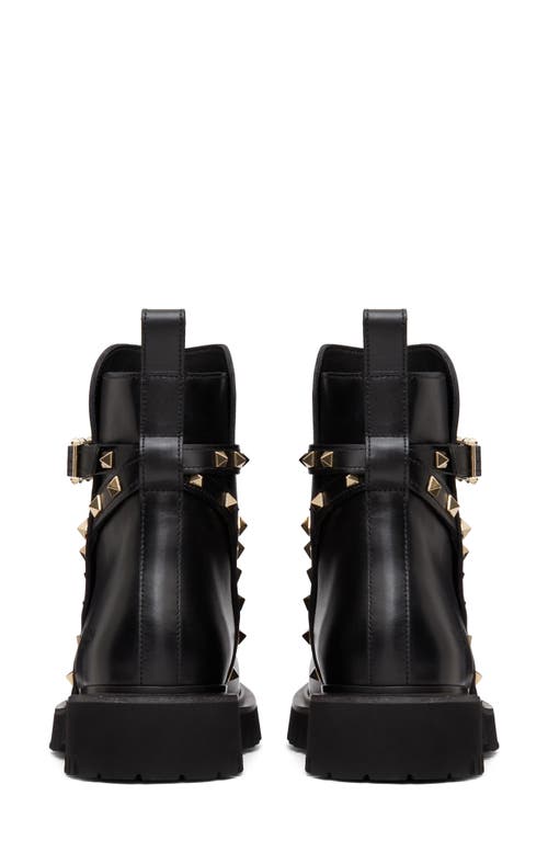 Shop Valentino Garavani Rockstud Combat Boot In Nero/gold