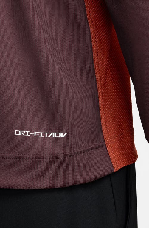 Shop Nike Golf Tour Dri-fit Adv Half Zip Golf Top In Dragon Red/burgundy Crush