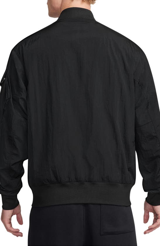 Shop Jordan Essentials Lightweight Nylon Renegade Jacket In Black