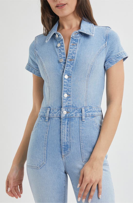 Shop Rolla's East Coast Flare Leg Denim Jumpsuit In Light Vintage Blue