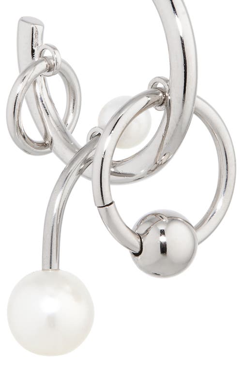 Shop Justine Clenquet Chase Hoop Charm Earrings In Palladium