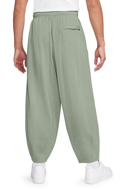 Shop Nike Club Fleece Oversize Pants In Jade Horizon/jade Horizon