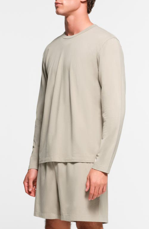 Shop Skims Relaxed Long Sleeve Jersey T-shirt In Shale