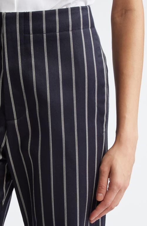 Shop Victoria Beckham Pinstripe Tapered Leg Wool & Cotton Trousers In Midnight/white