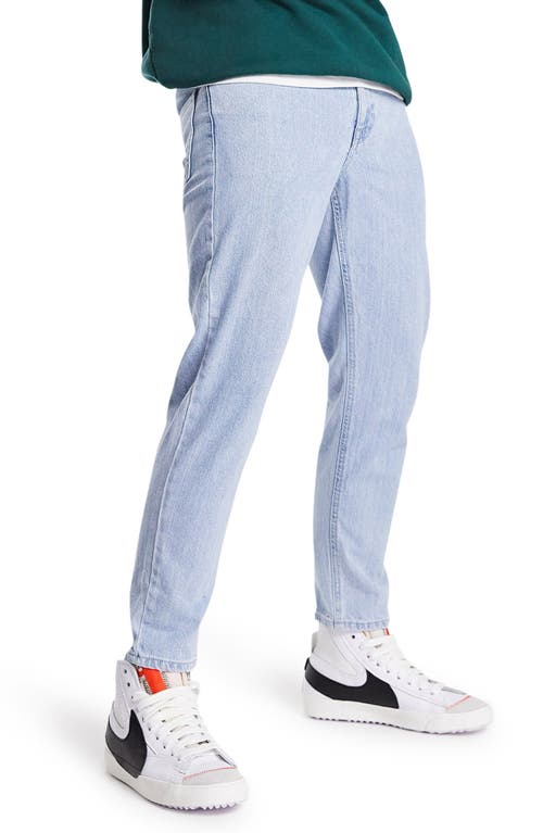 ASOS DESIGN Classic Rigid Straight Leg Jeans in Mid Blue