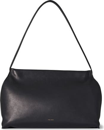 Stay organized in style with our Sienna Hobo Bag. With its soft leathe