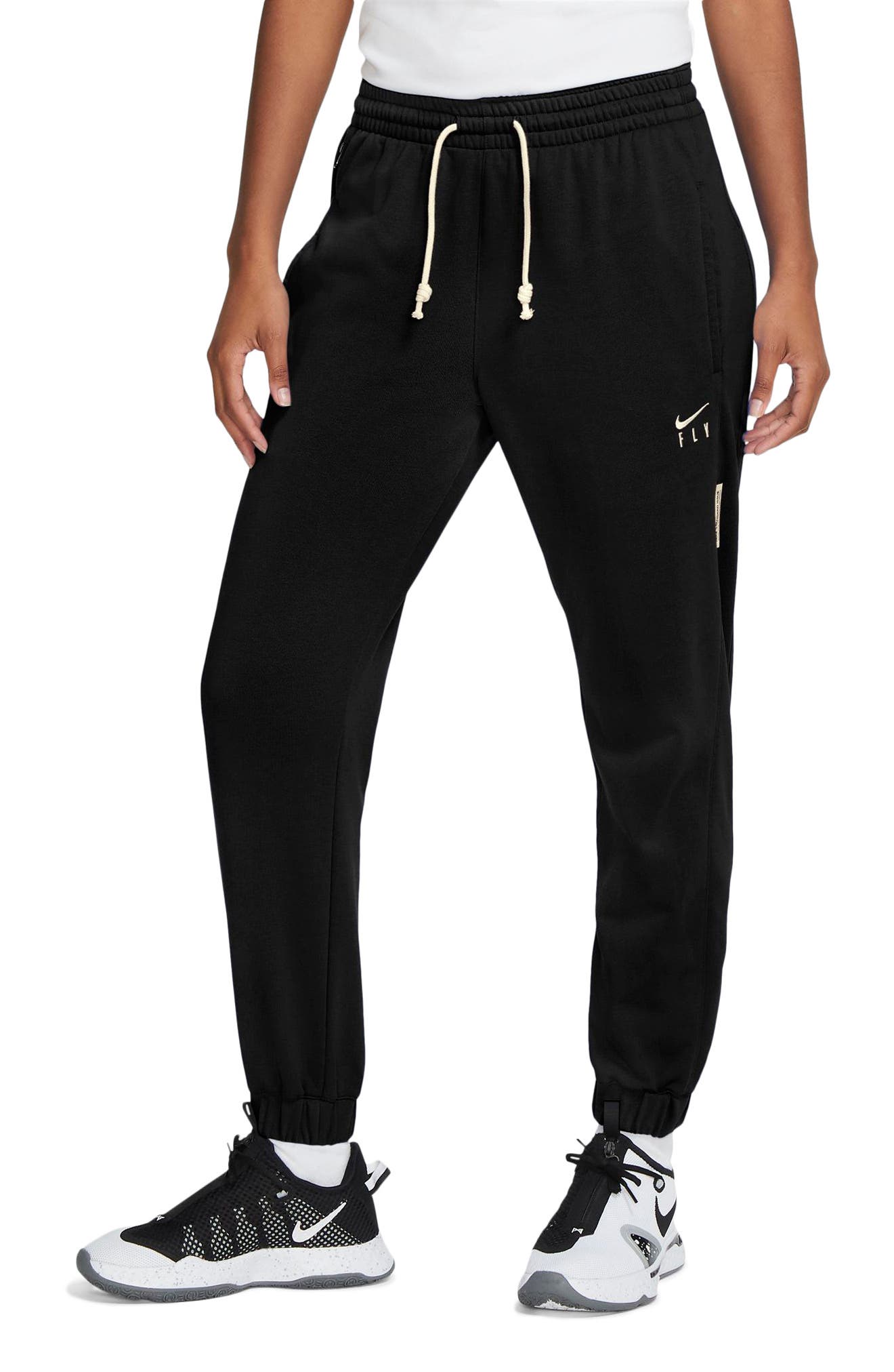 nike basketball standard issue fly logo joggers in black