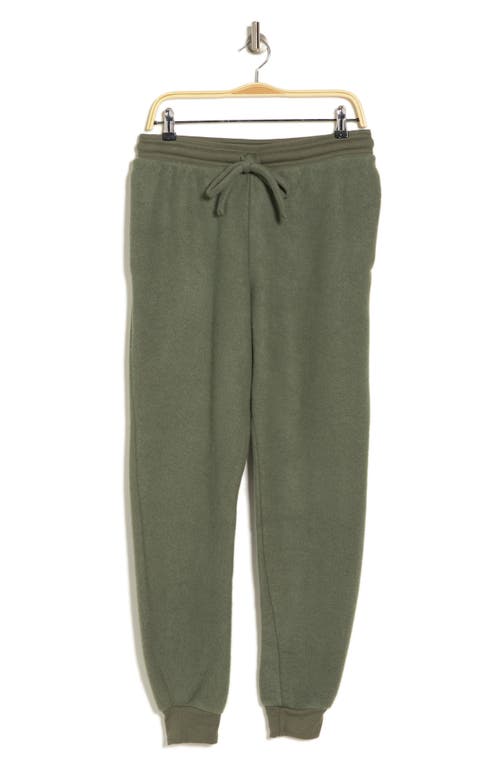 Shop Bella+canvas Faux Suede Joggers In Military Green