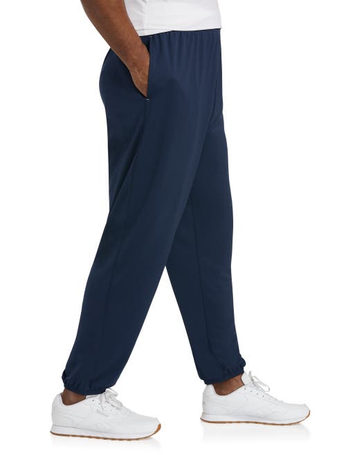 Shop Reebok Performance Jersey Elastic-hem Tech Pants In Navy