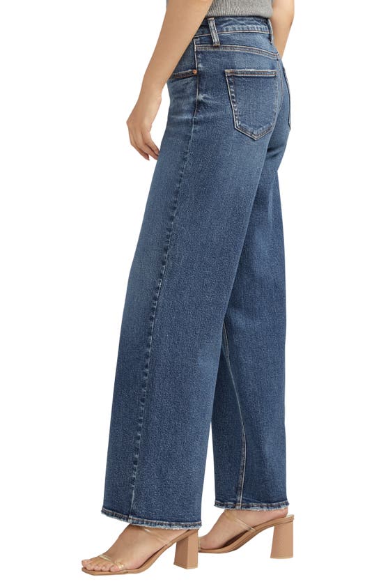 Shop Silver Jeans Co. Suki Curvy Mid Rise Wide Leg Jeans In Indigo