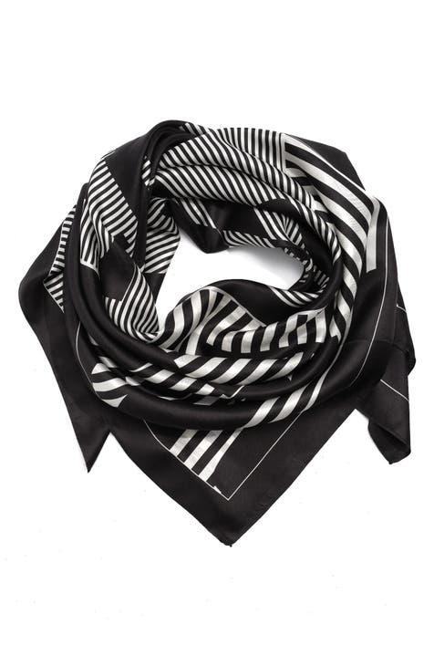 Logo embellished silk twill scarf in black - Burberry