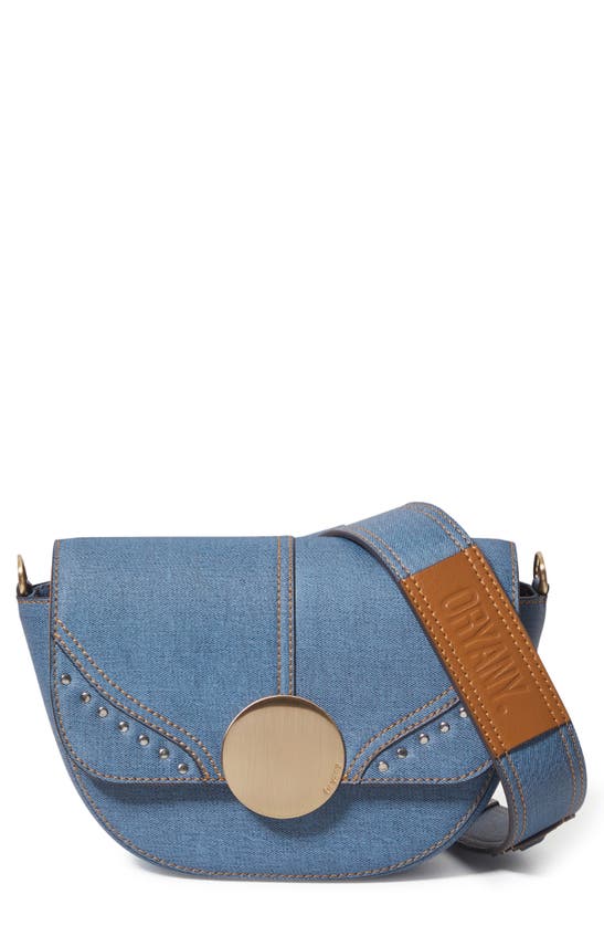 Shop Oryany Lottie Denim Crossbody Bag In Denim Blue