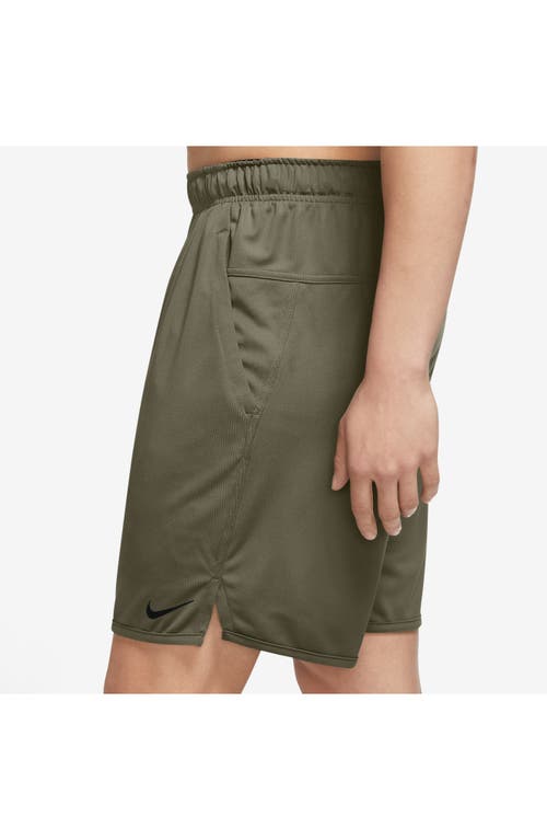 Shop Nike Dri-fit 7-inch Brief Lined Versatile Shorts In Olive/black