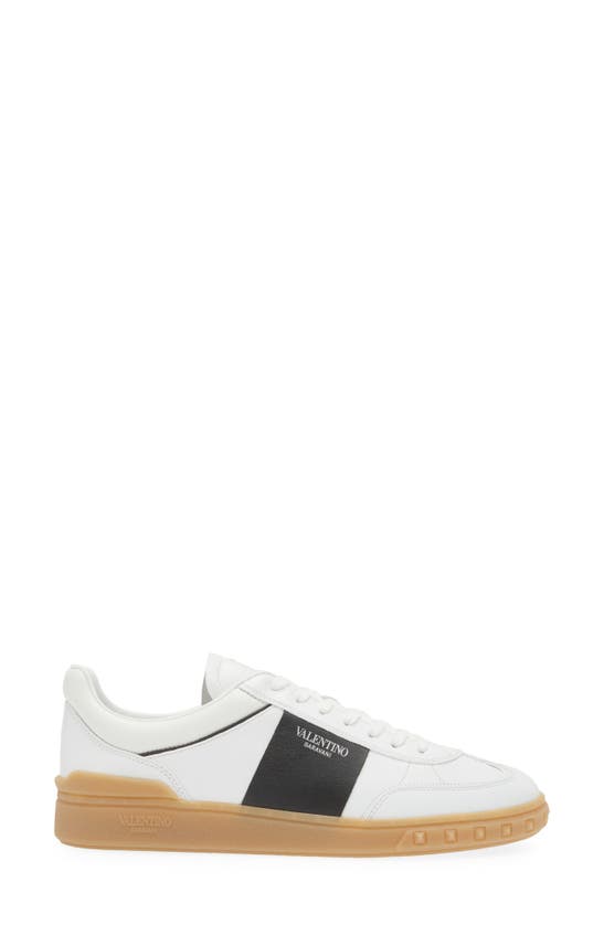 Shop Valentino Garavani Upvillage Low Top Sneaker In A01 - Bianco-nero/ambra