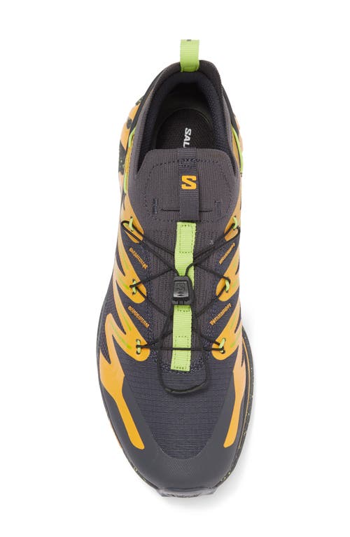 Shop Salomon Gender Inclusive Xt-rush 2 Sneaker In Ebony/blazing Orange/lime