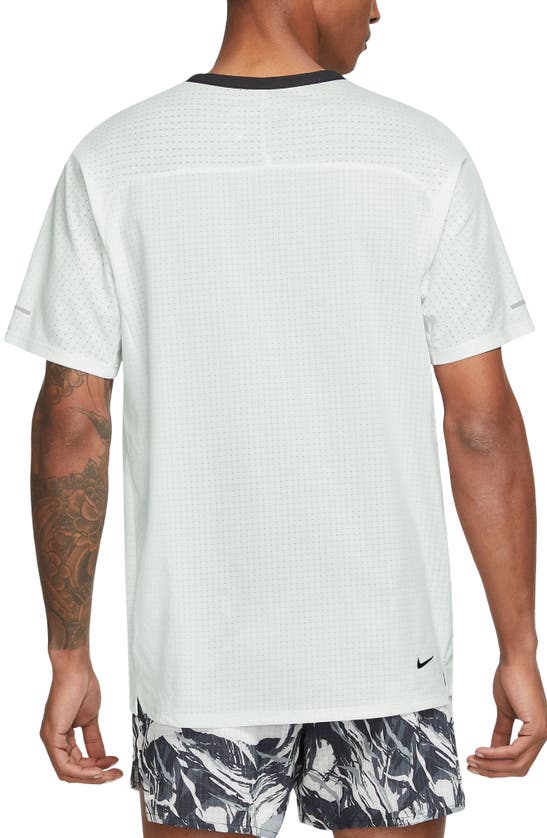 Shop Nike Dri-fit Trail Solar Chase Performance T-shirt In Summit White/ Black