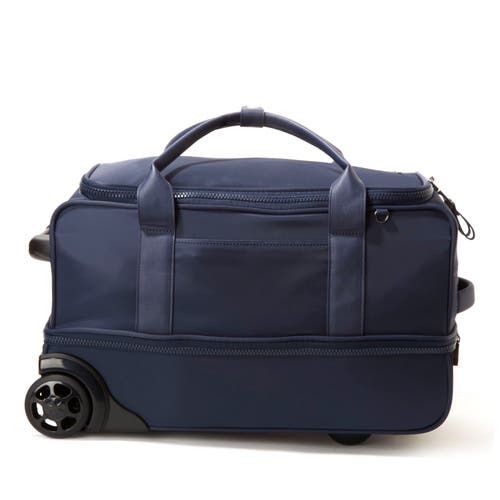 Baggallini Gramercy Wheeled Carry On Duffel Bag In French Navy