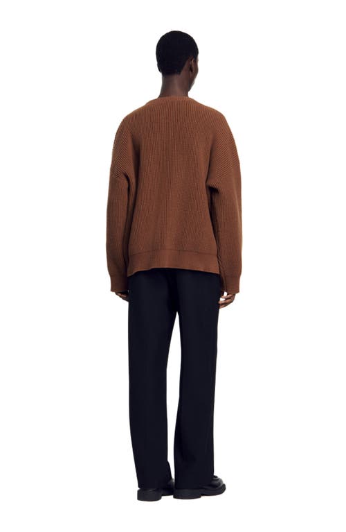 Shop Sandro Rib Knit Sweater In Caramel