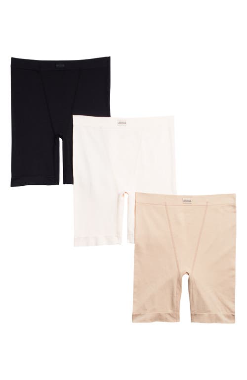 Shop Danskin Seamless 3-pack Slip Shorts In Tan/afterglow/black