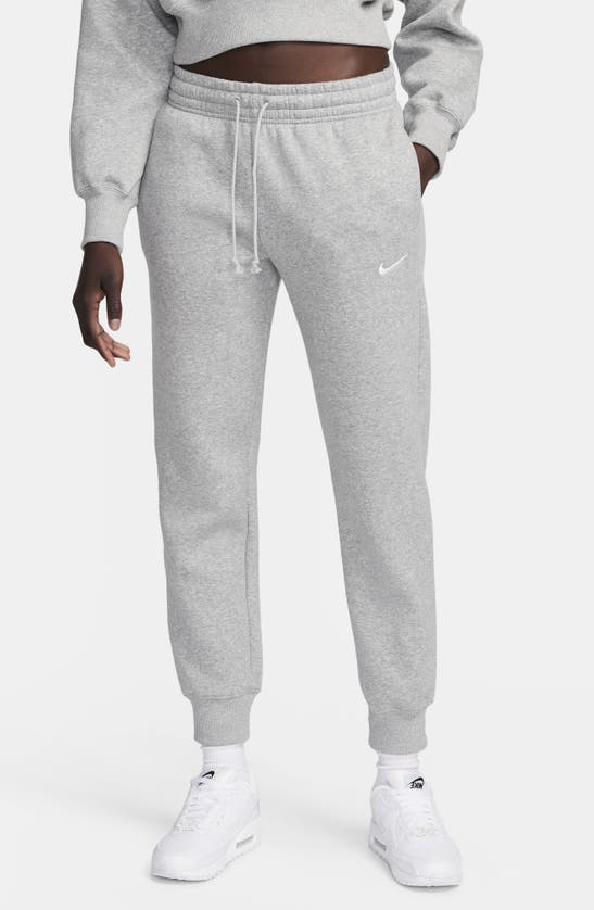 Shop Nike Sportswear Phoenix Fleece Mid Rise Joggers In Dark Grey Heather/ Sail